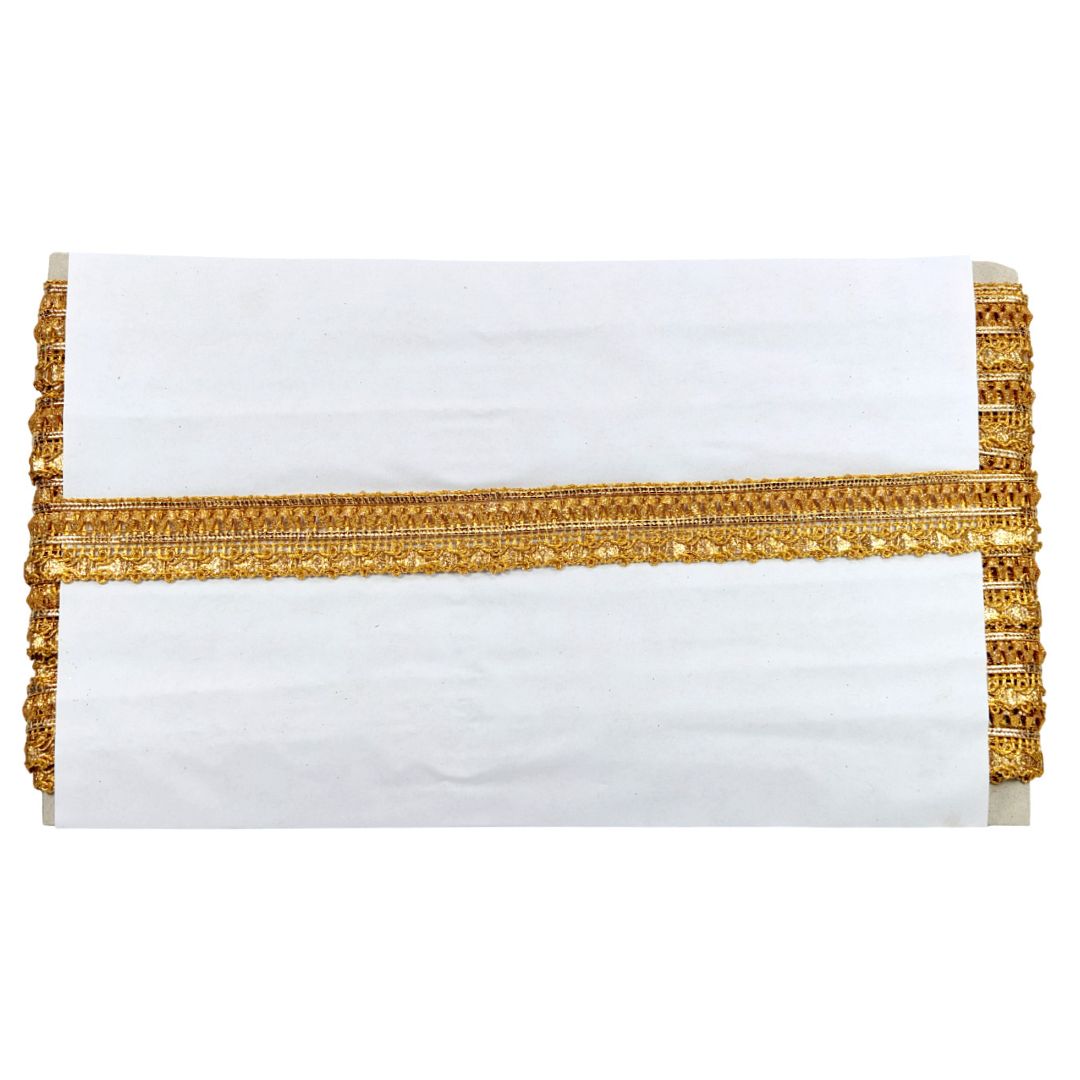 White pillow with gold decorative trim on a white background