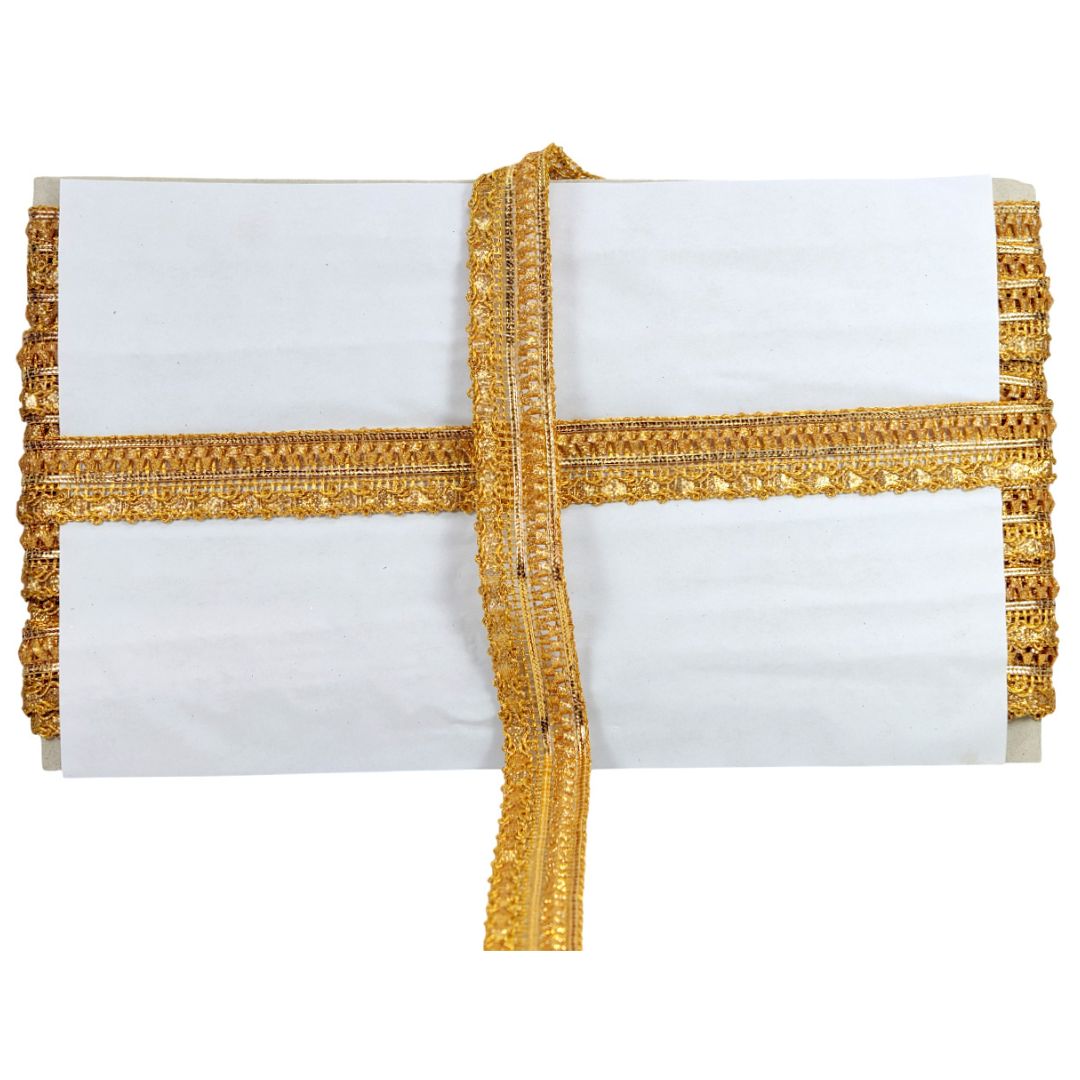 White clutch with gold decorative border on a white background