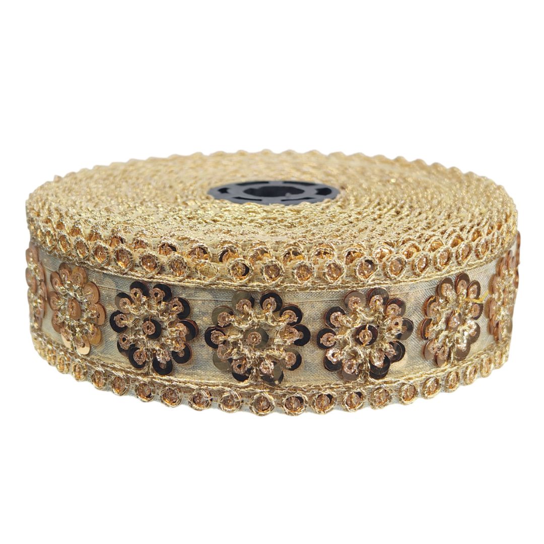 Gold decorative ribbon with floral patterns on a white background