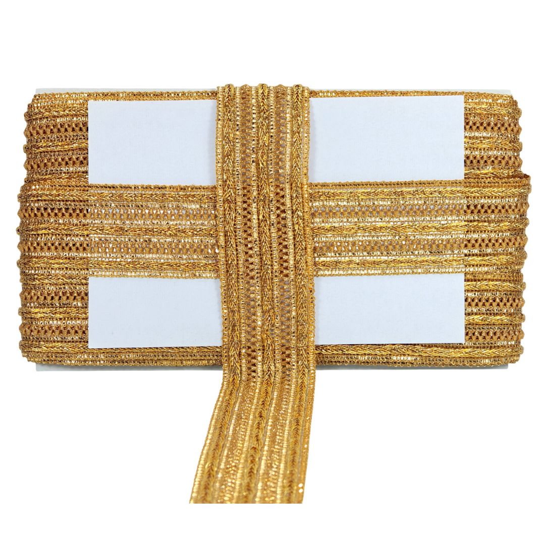 Gold metallic ribbon with four white card holders on a white background