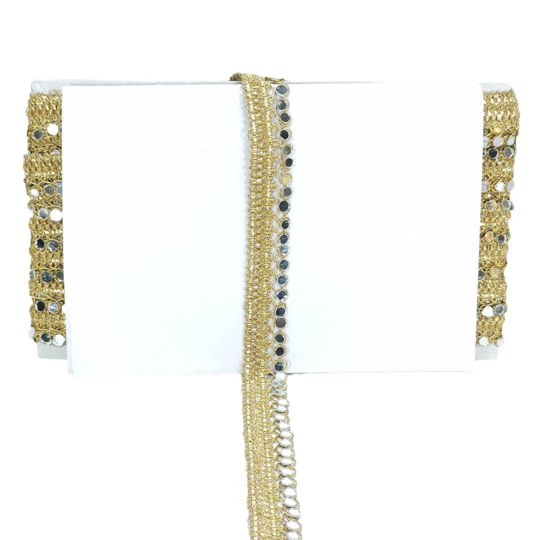 Gold beaded bracelet on a white background