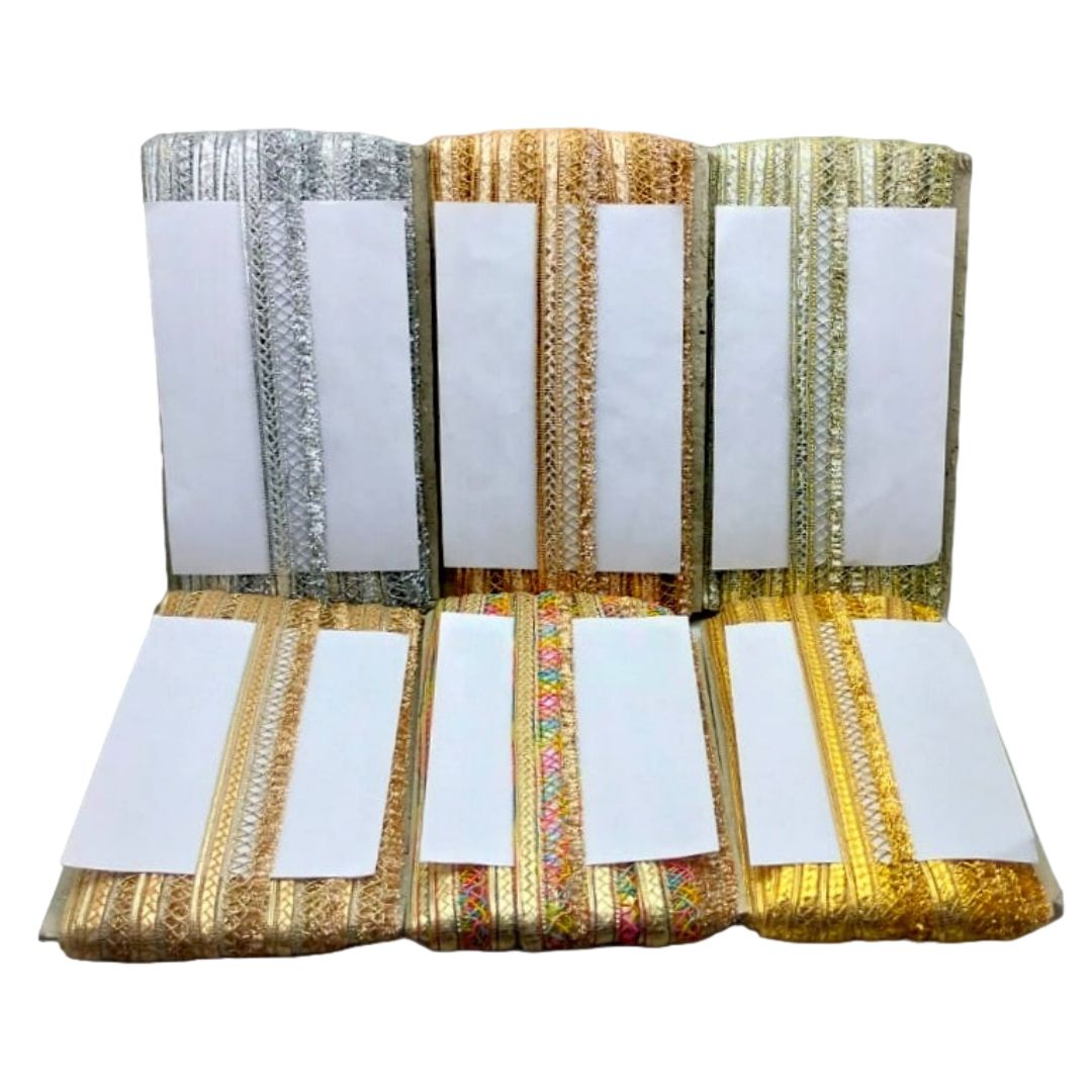 Decorative pillow with gold and silver striped patterns on a white background