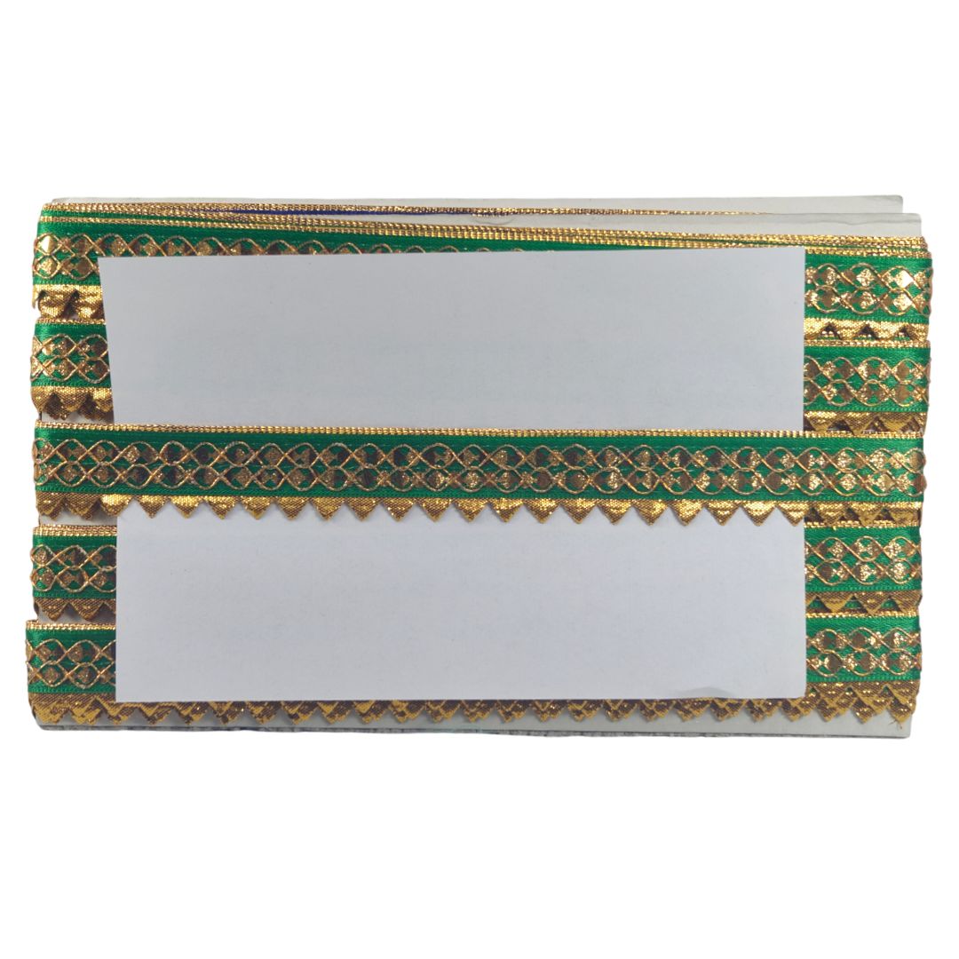 Decorative clutch with green and gold patterns on a white background