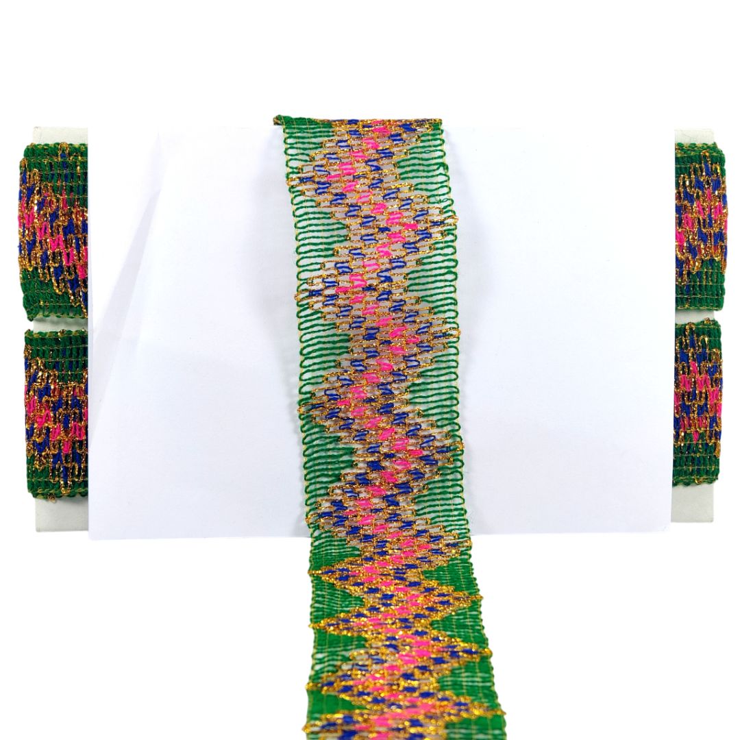 Colorful beaded bracelet with a zigzag pattern on a white background