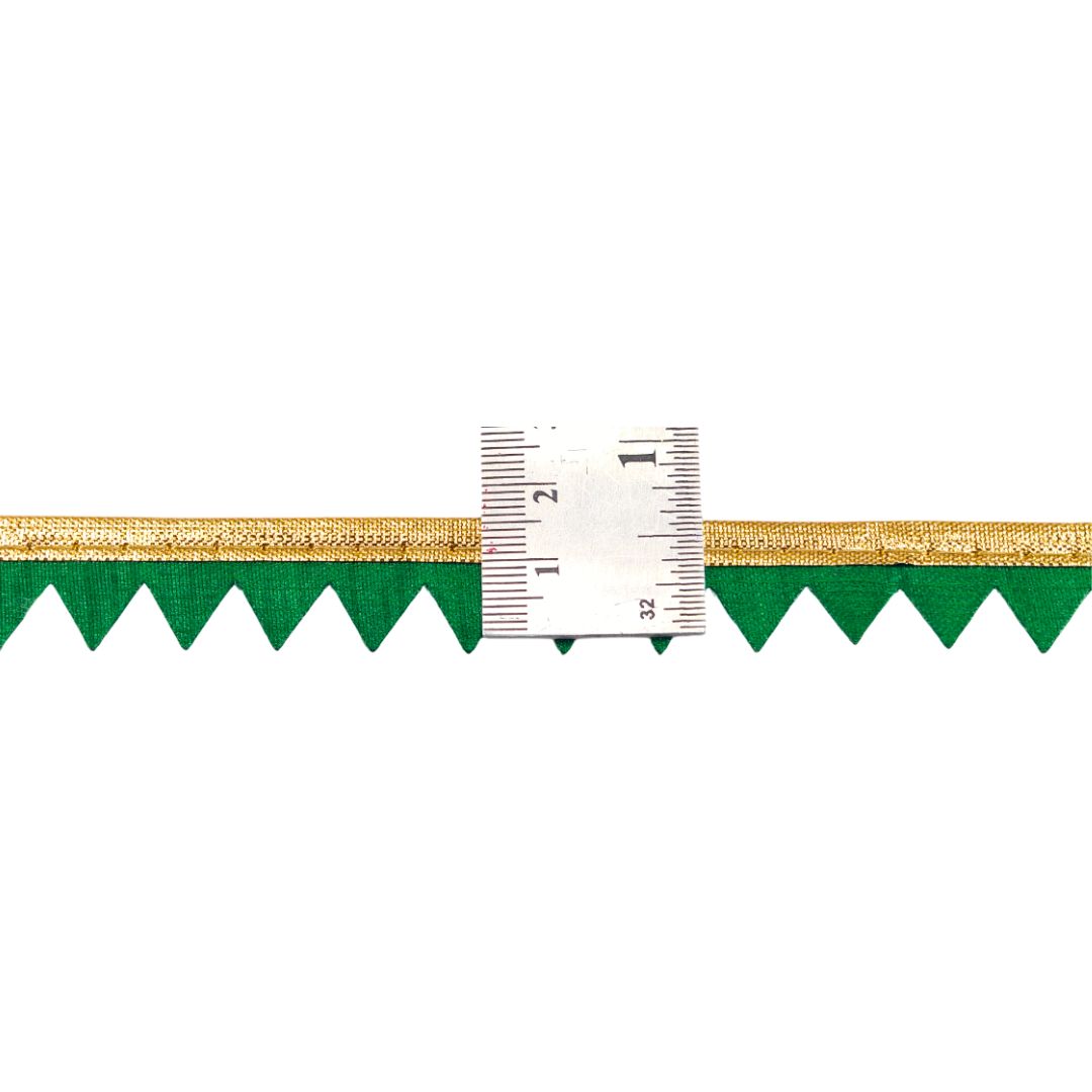 Green and gold border with a ruler for measurement on a white background