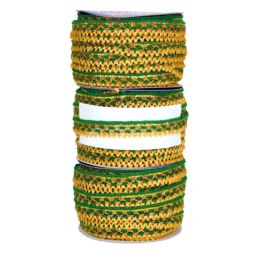 Set of green and gold bangles on a white background