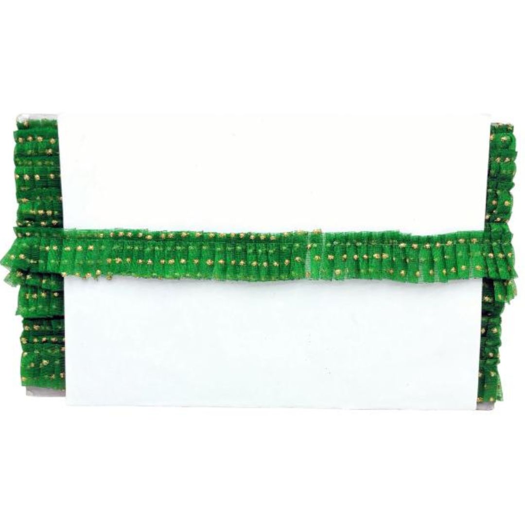Green decorative ribbon with gold accents on a white background