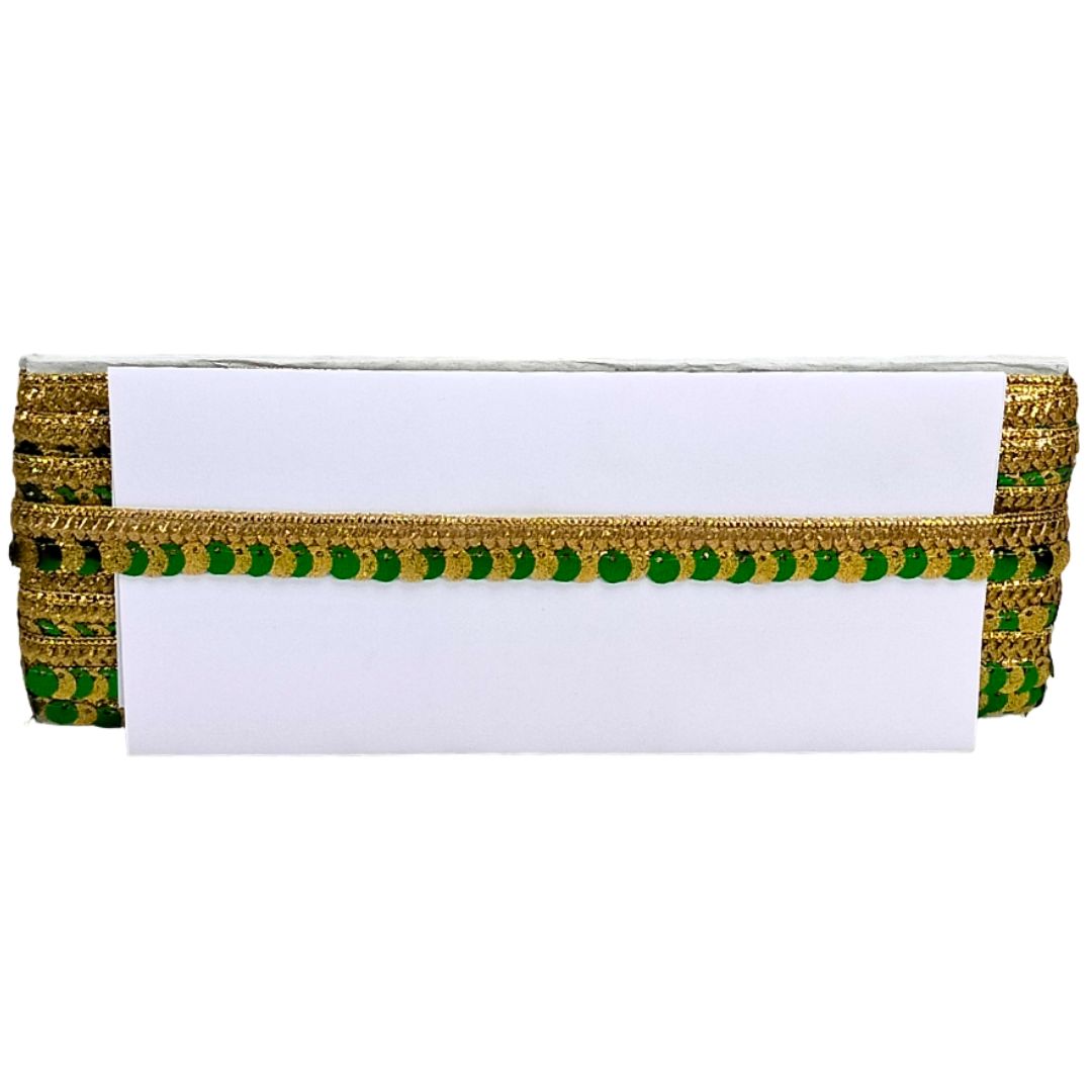 White box with gold and green decorative trim on a white background