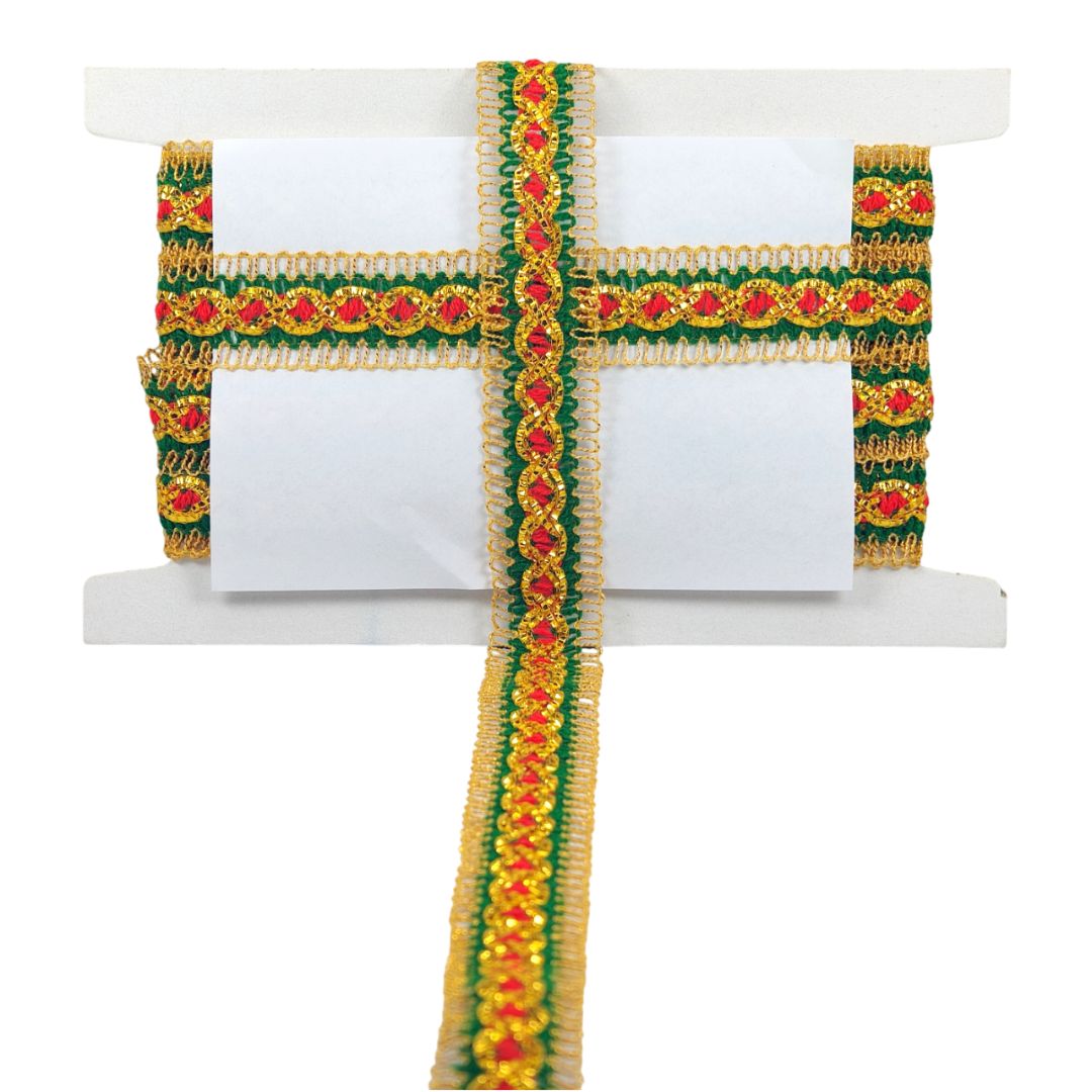 Decorative ribbon with green, gold, and red patterns on a white background