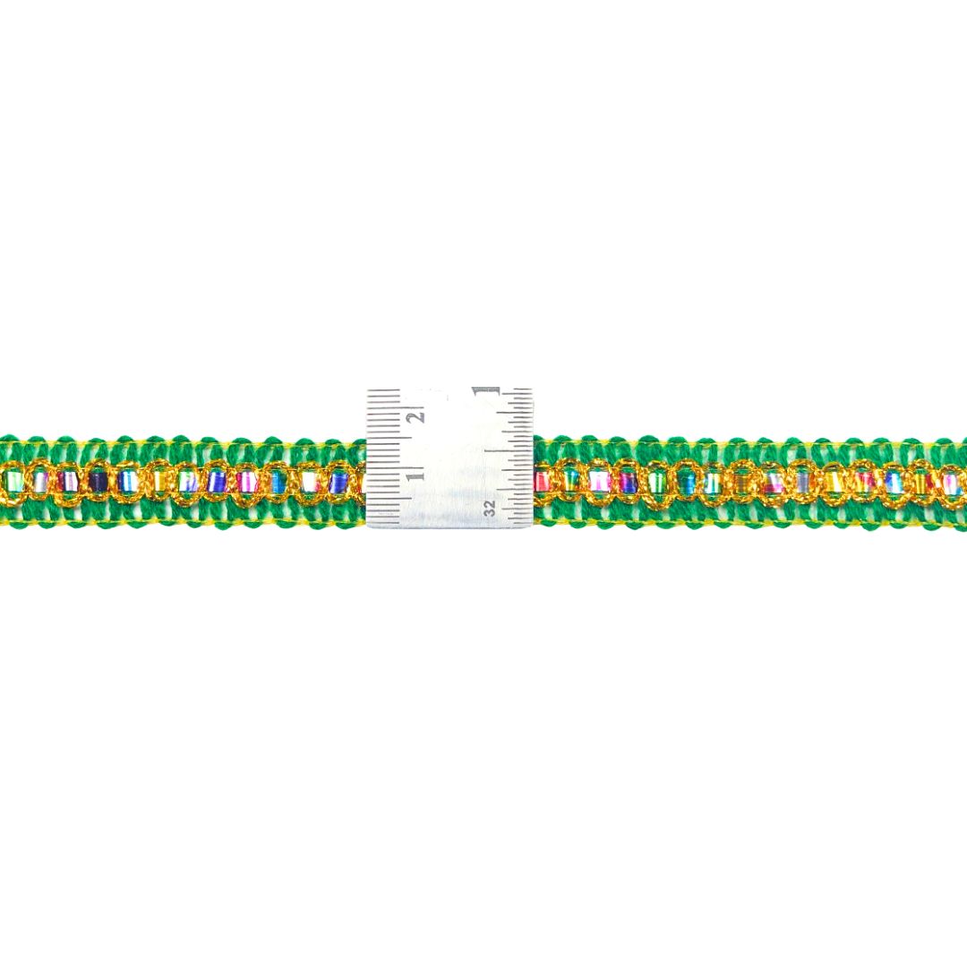 Bracelet with colorful stones and a ruler for size reference on a white background