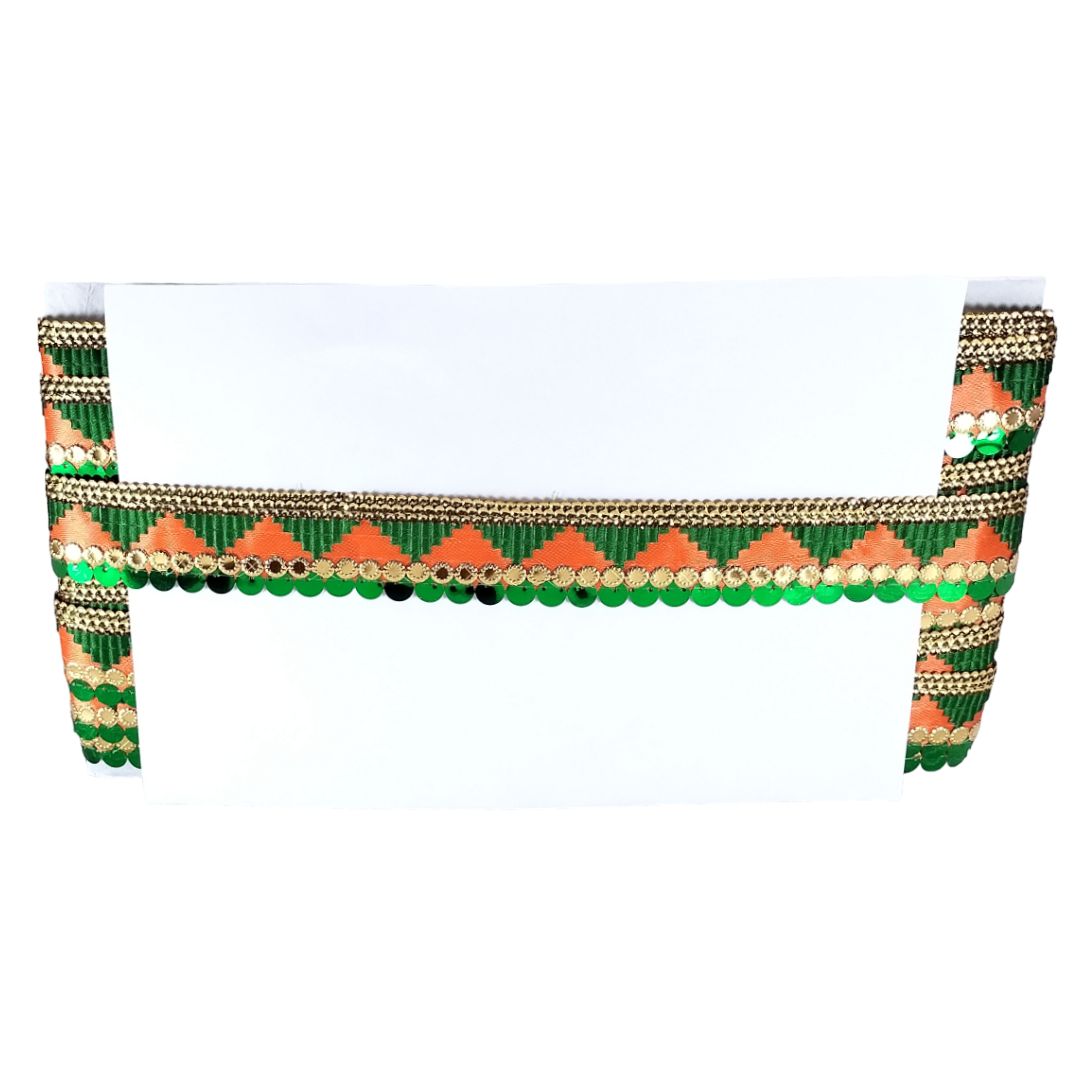 Decorative headband with green, orange, and gold pattern on a white background