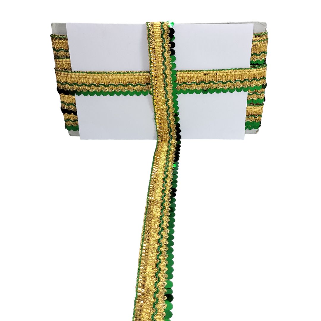 White box with gold and green decorative ribbon on a white background