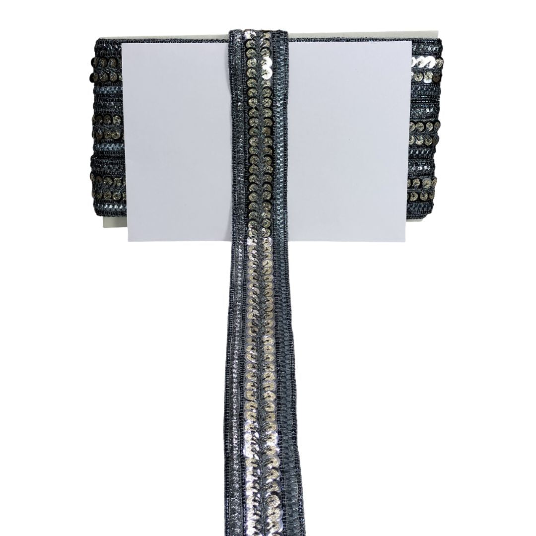 Black beaded card holder on a white background