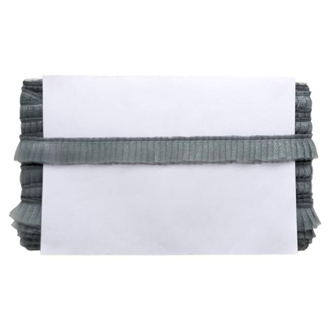 Gray textured blanket folded on a white background