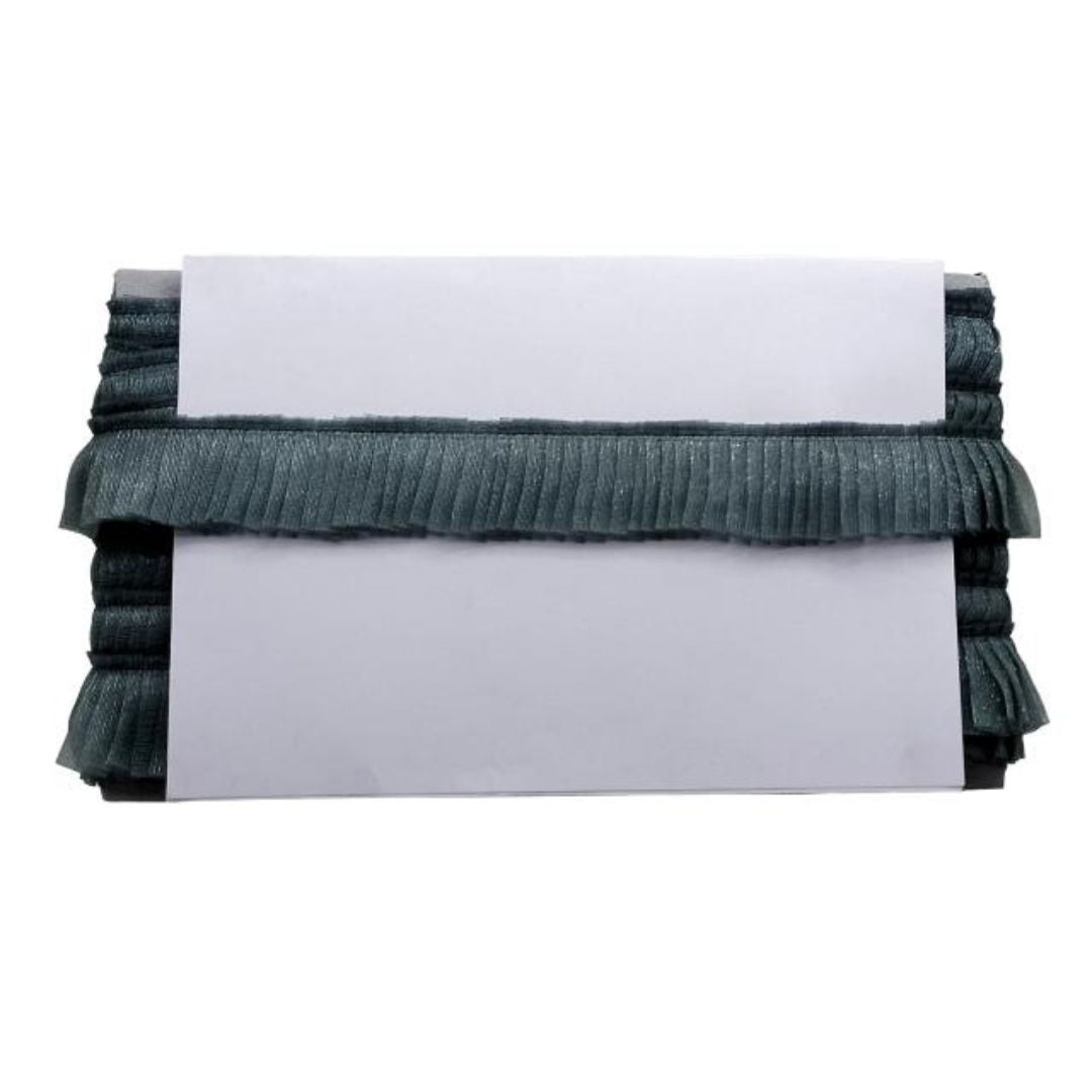 Stack of white papers with a green ribbed border on a white background