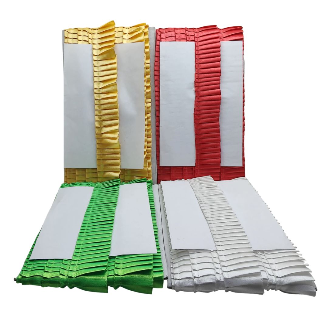 Set of colorful ribbons in gold, red, green, and white on a white background