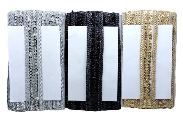 Three ribbons in silver, black, and gold on a white background