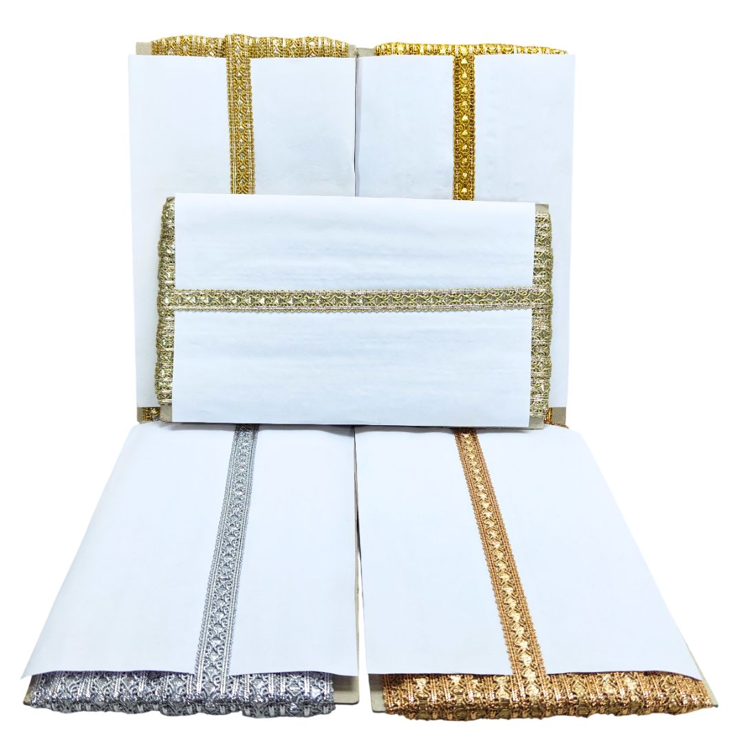 White fabric with gold and silver trim on a white background