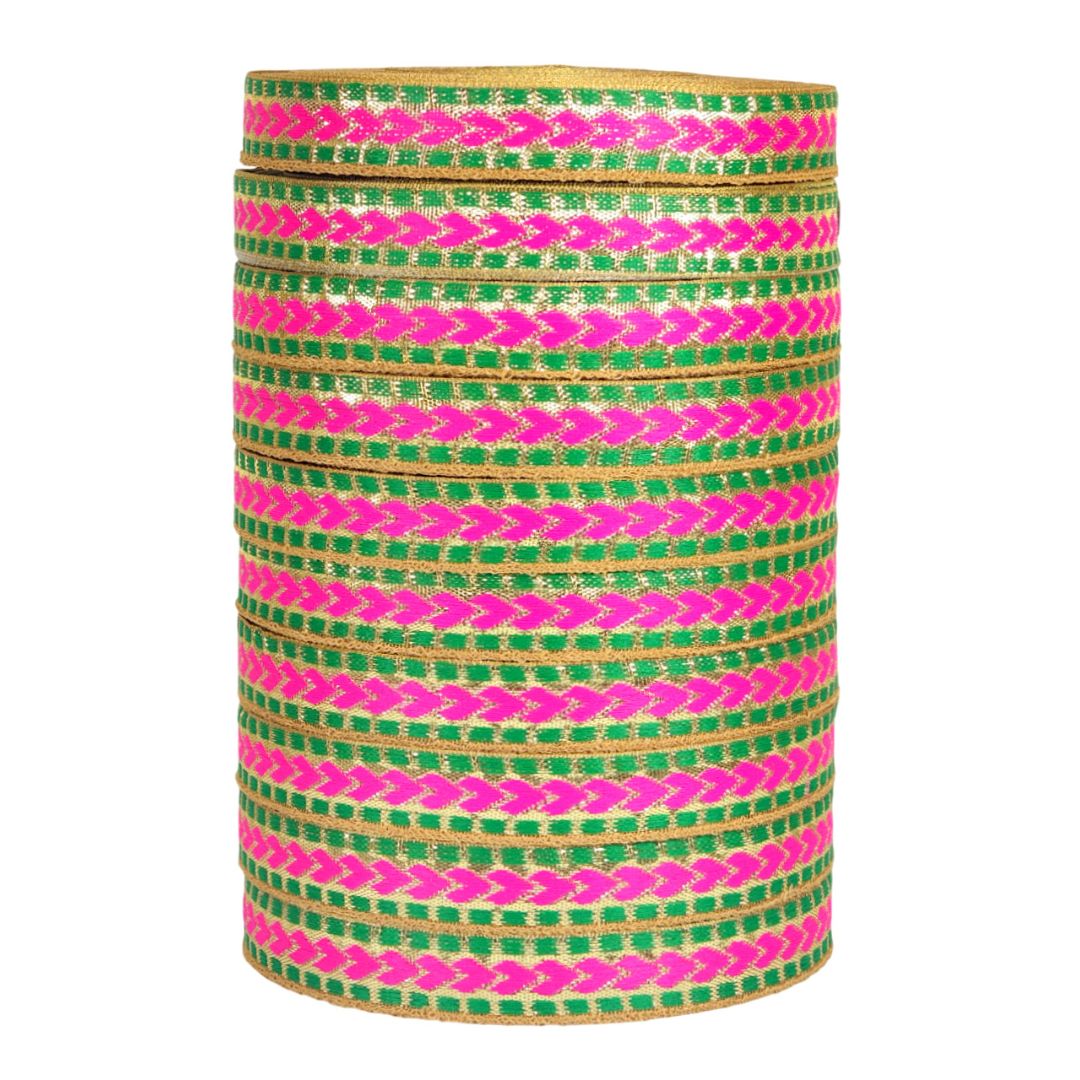 Set of colorful bangles with green and pink pattern on a white background