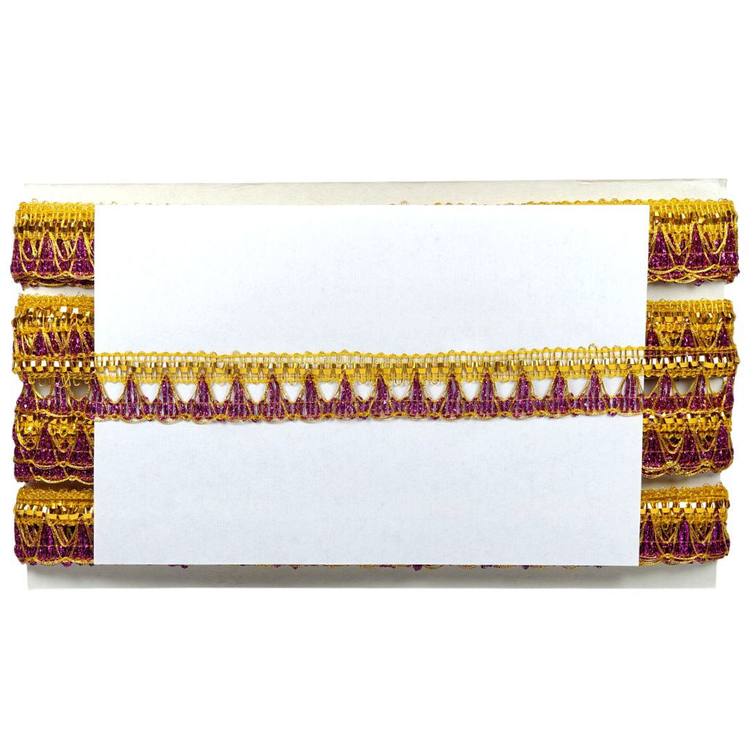 Decorative trim with gold and purple patterns on a white background