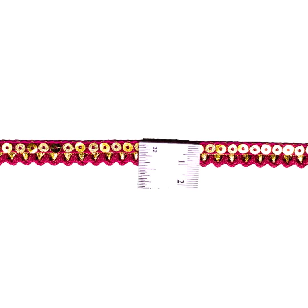 Decorative trim with floral pattern and measuring scale on a white background