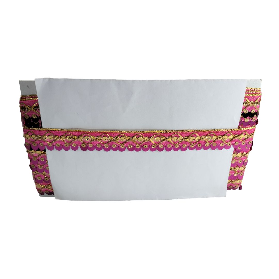 Decorative pink and gold border on a white background