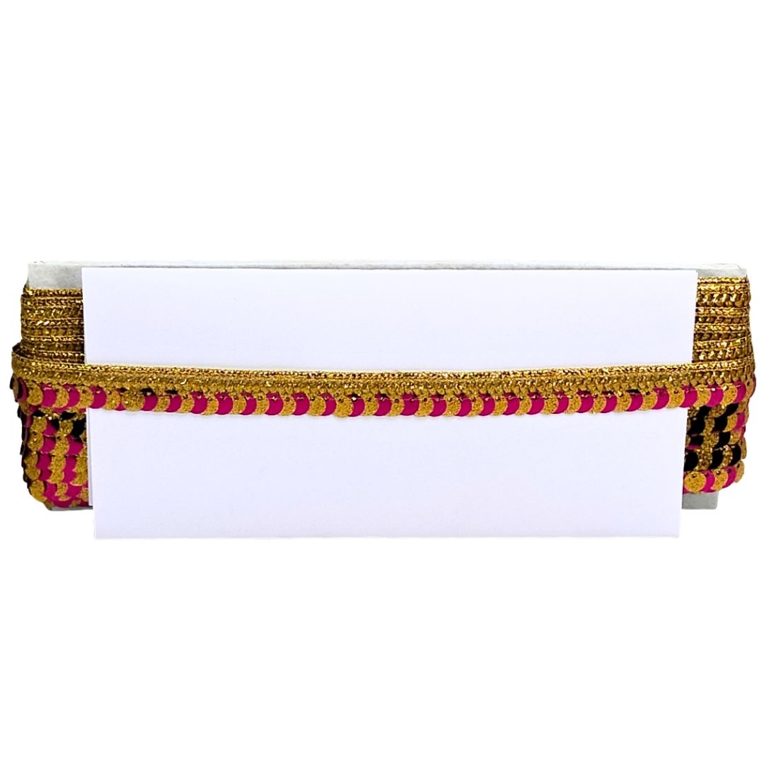 Decorative band with gold and pink pattern on a white background