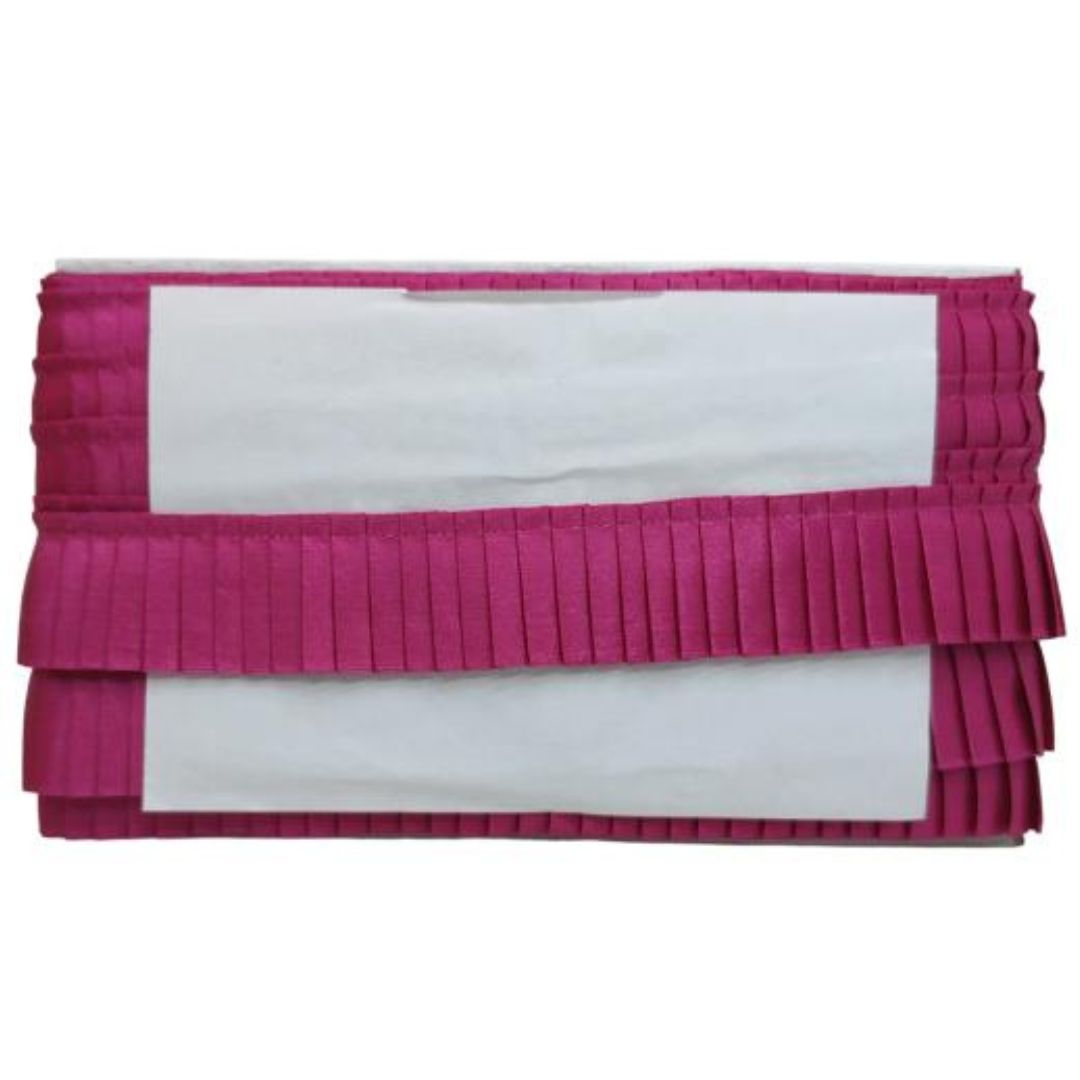 White clutch with pink pleated detailing on a white background