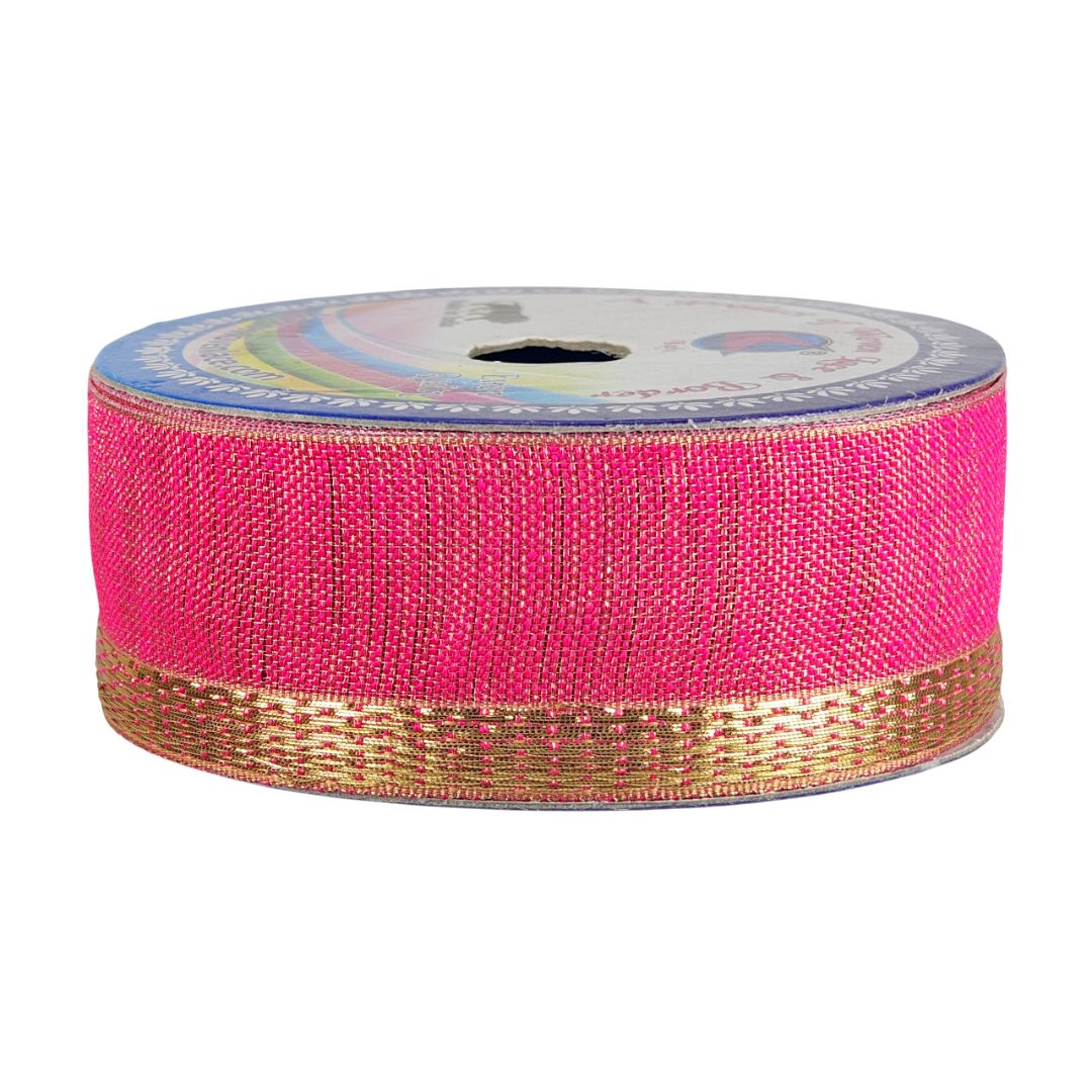 Roll of pink ribbon with gold edge on a white background