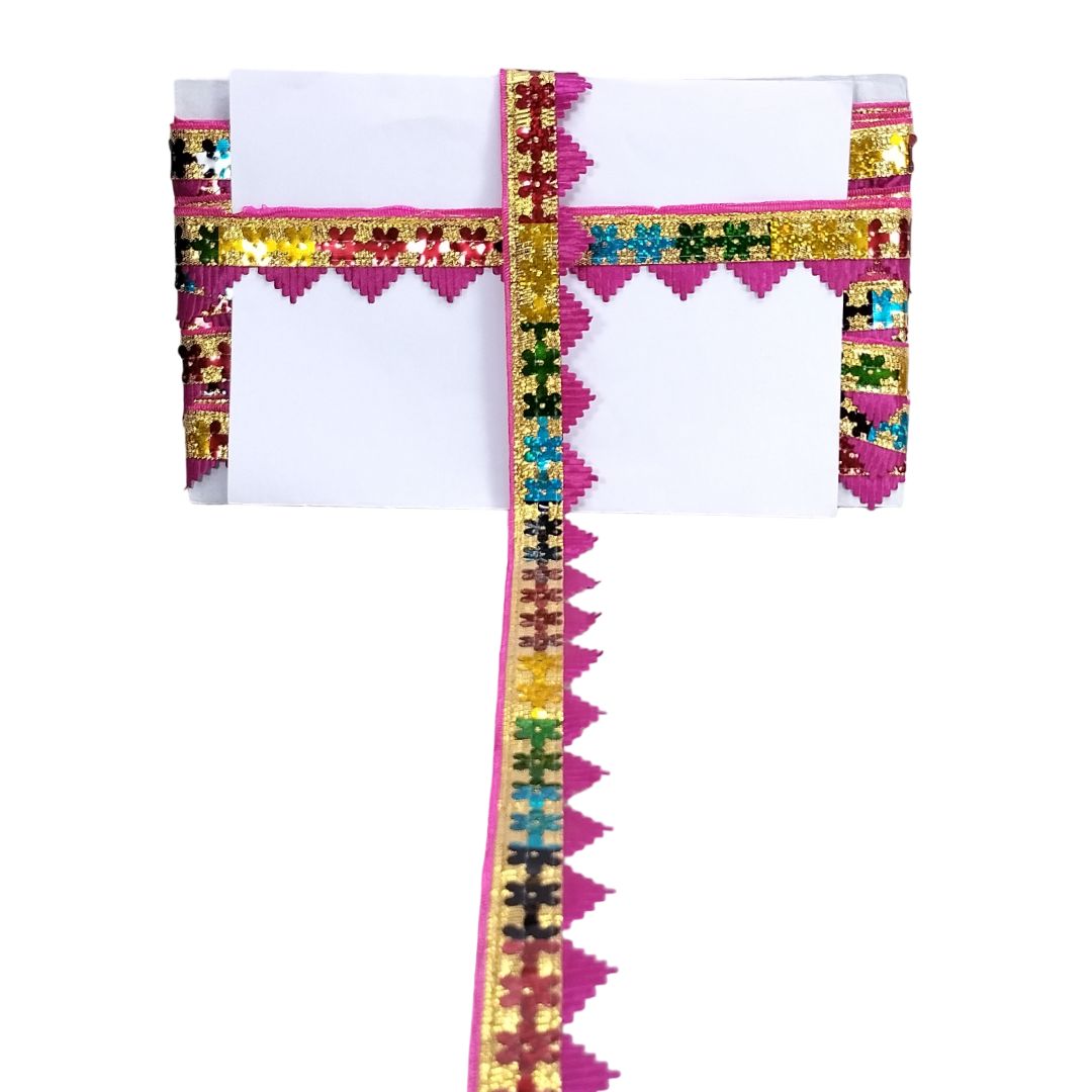 Traditional garment with colorful border design on a white background
