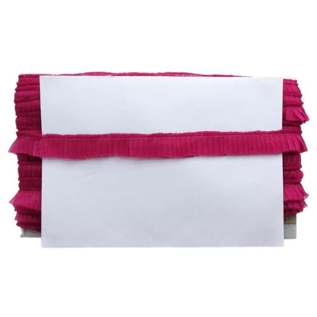 Stack of white cards with pink ribbons on a white background