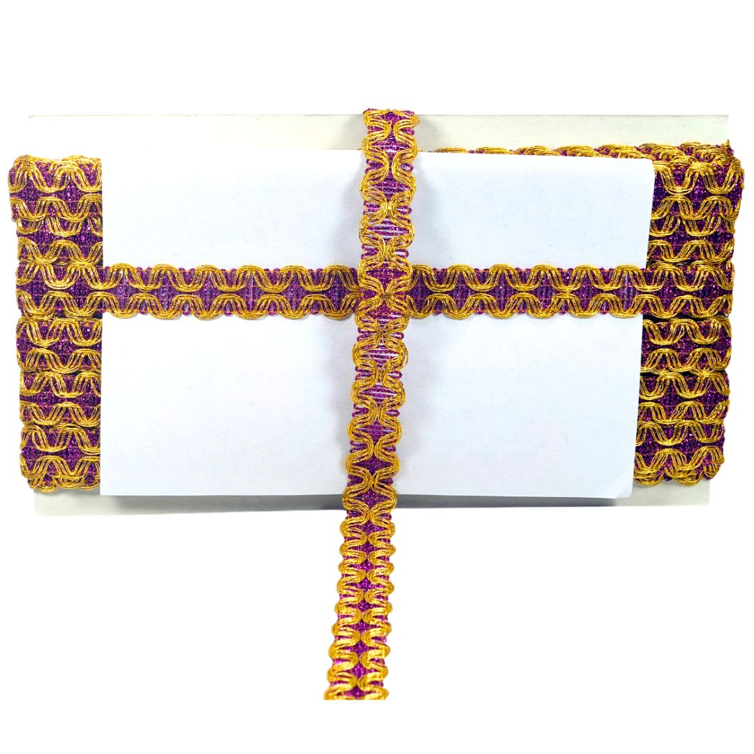 Purple and gold patterned belt on a white background