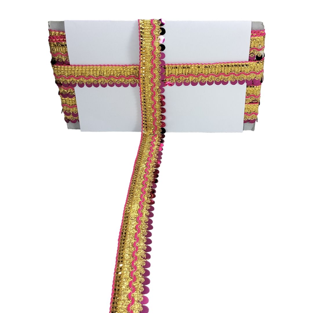 Decorative fabric border with pink and gold trim on a white background
