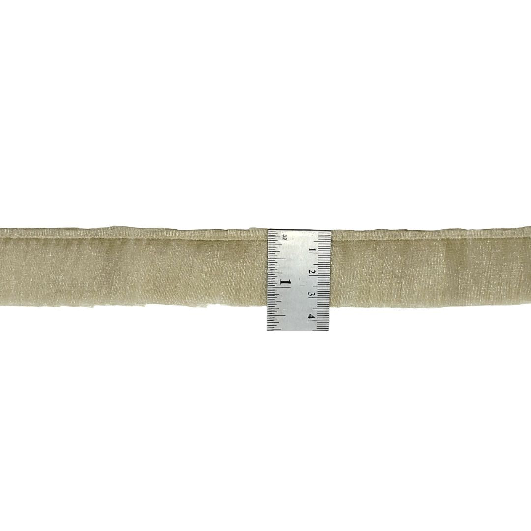 Beige burlap ribbon with a ruler for scale on a white background