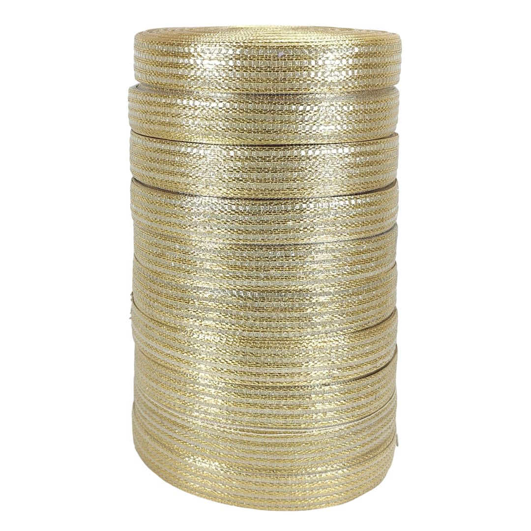 Stack of gold braided wire on a white background