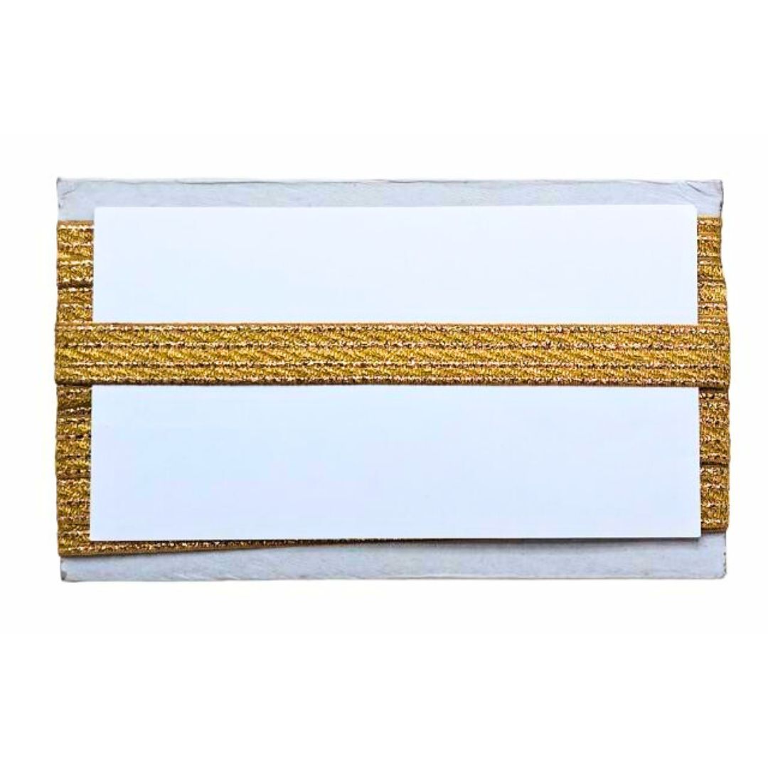 Gold glittery cardholder with white cards on a white background