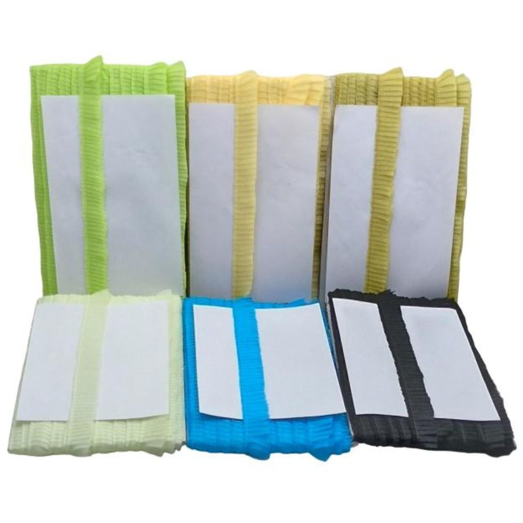 Set of colorful mesh screen cleaning tools on a white background