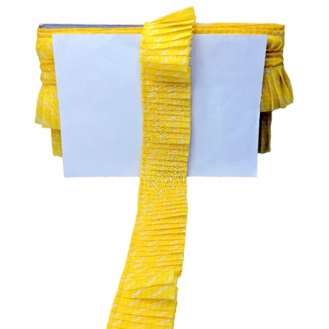 Yellow fabric with a textured pattern on a white background