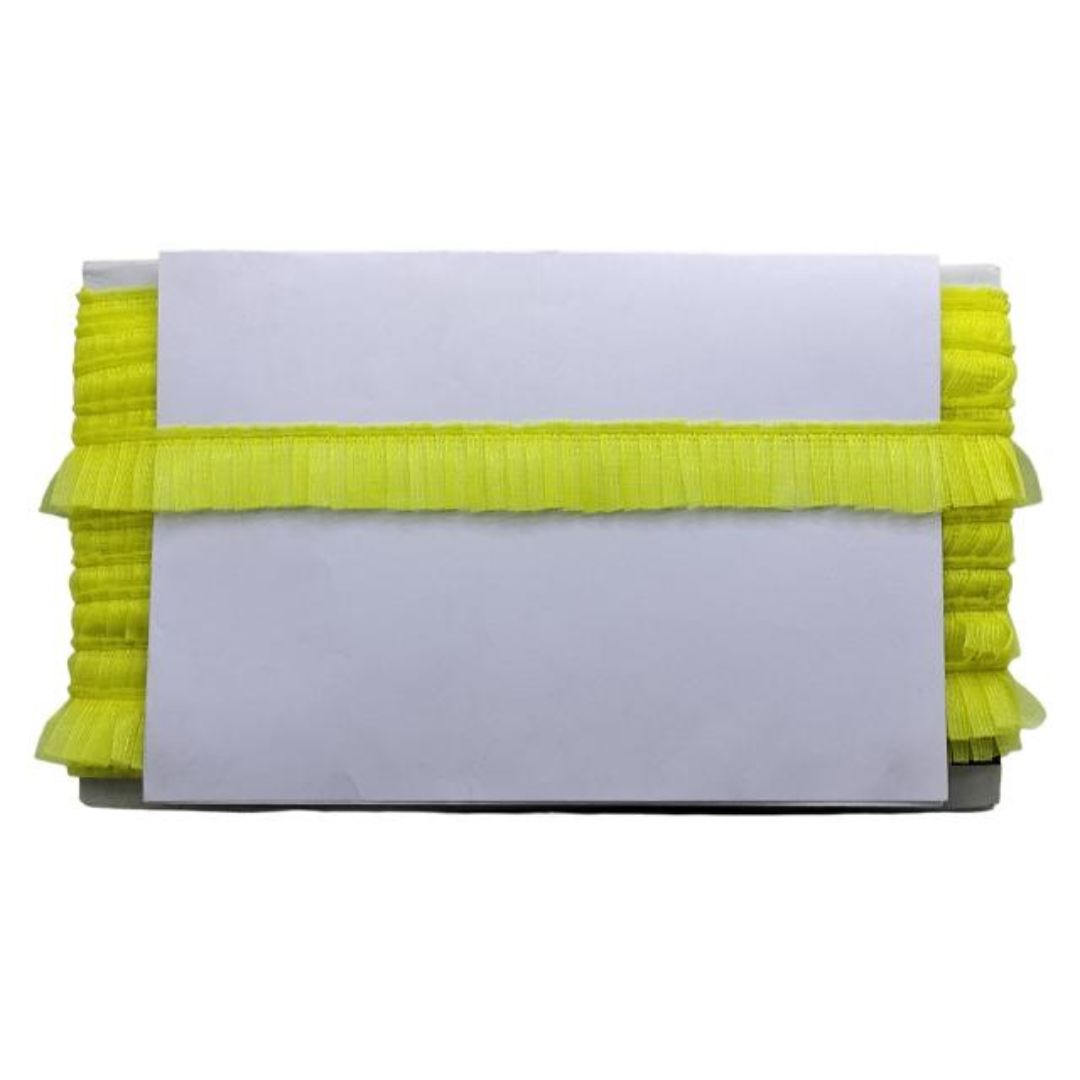 White card with yellow ruffled trim on a white background