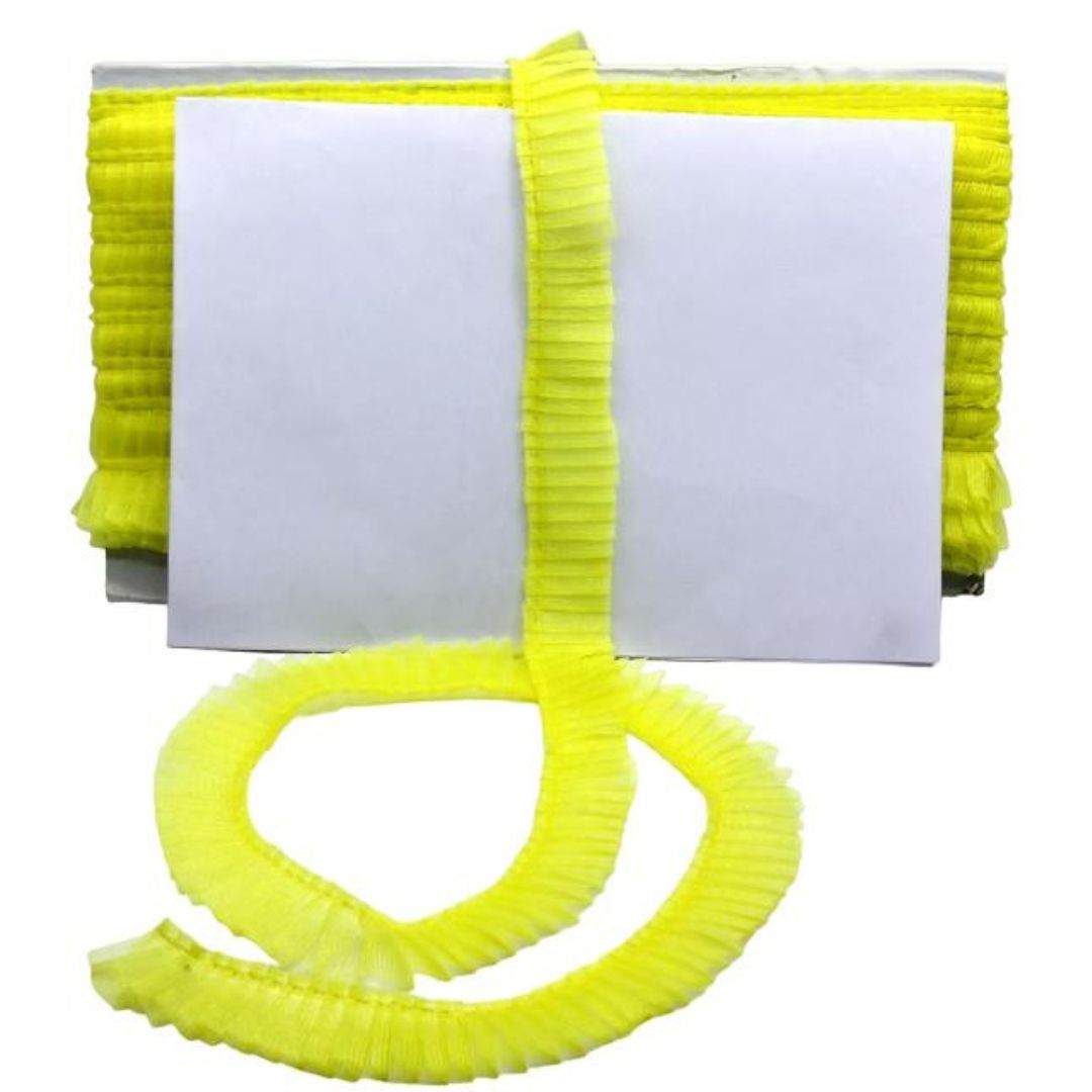 Yellow ribbed belt with a white label on a white background