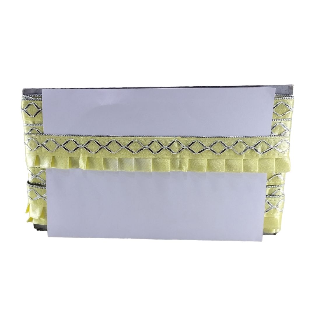 Yellow table skirt with decorative pattern on a white background