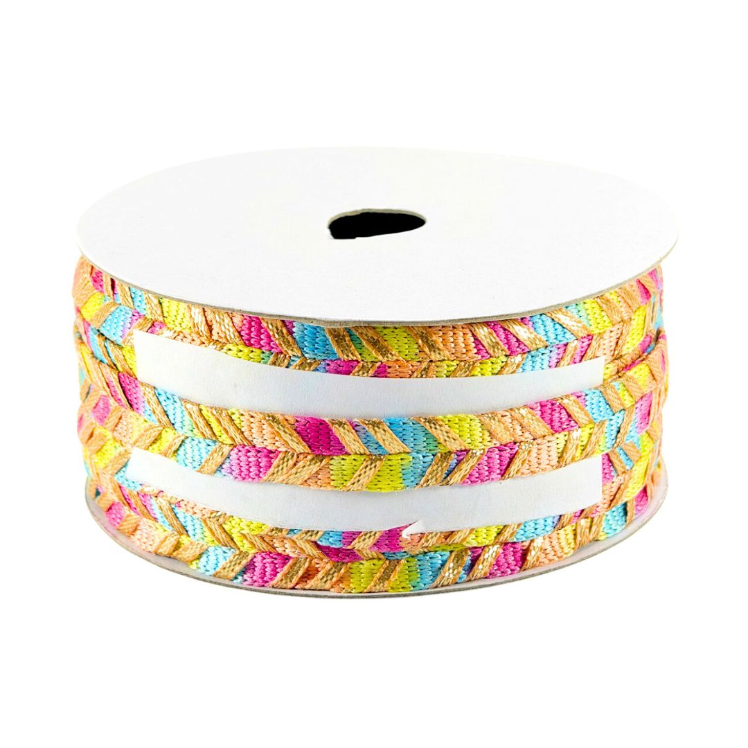 Spool of colorful braided ribbon on a white background