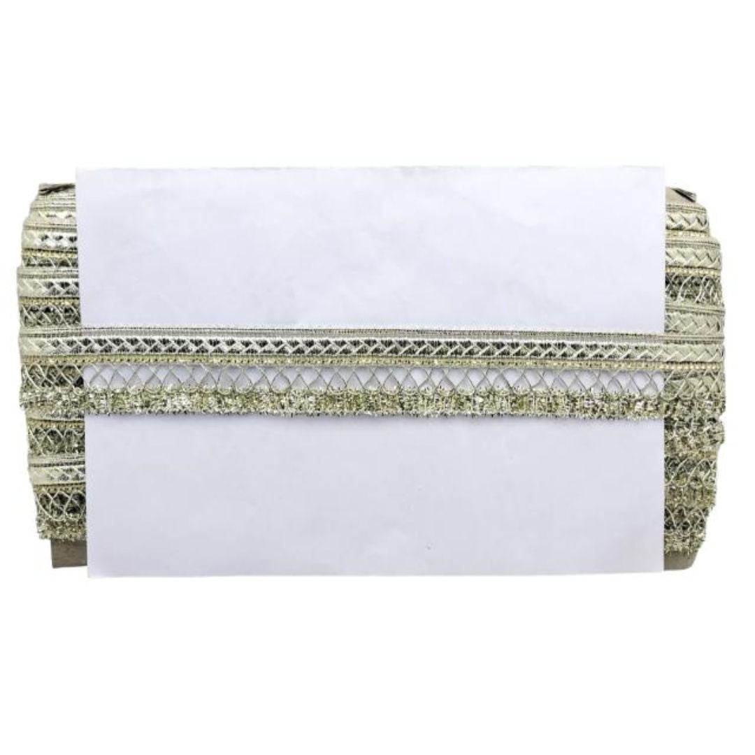 White clutch bag with gold lace detailing on a white background