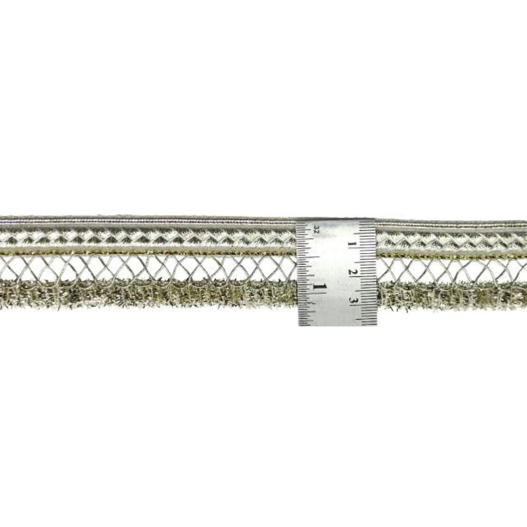 Textured cable with a ruler for scale on a white background