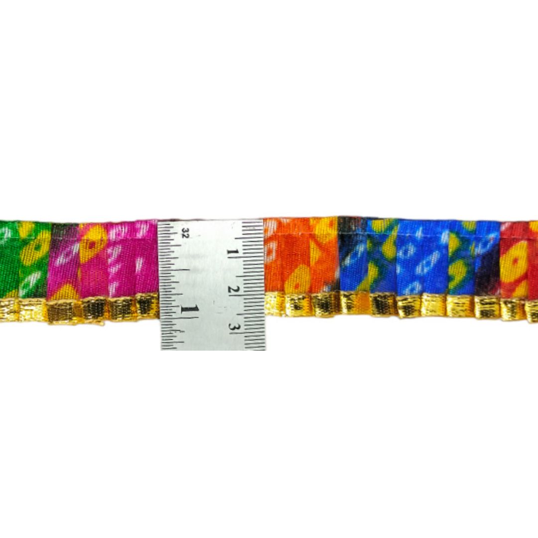 Colorful fabric strip with a measuring tape on a white background
