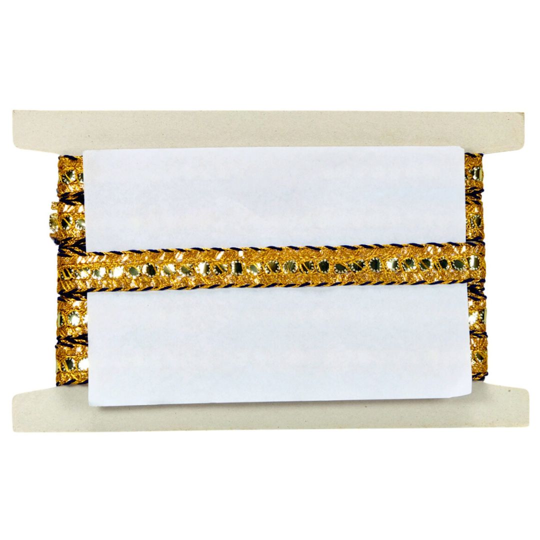 Decorative ribbon with gold and black pattern on a white background