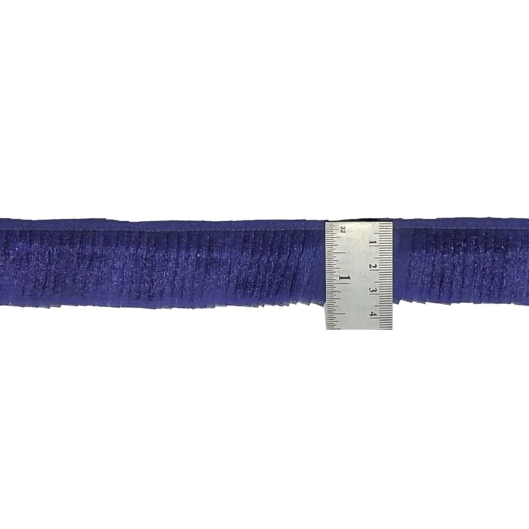 Navy blue belt with a metal ruler on a white background