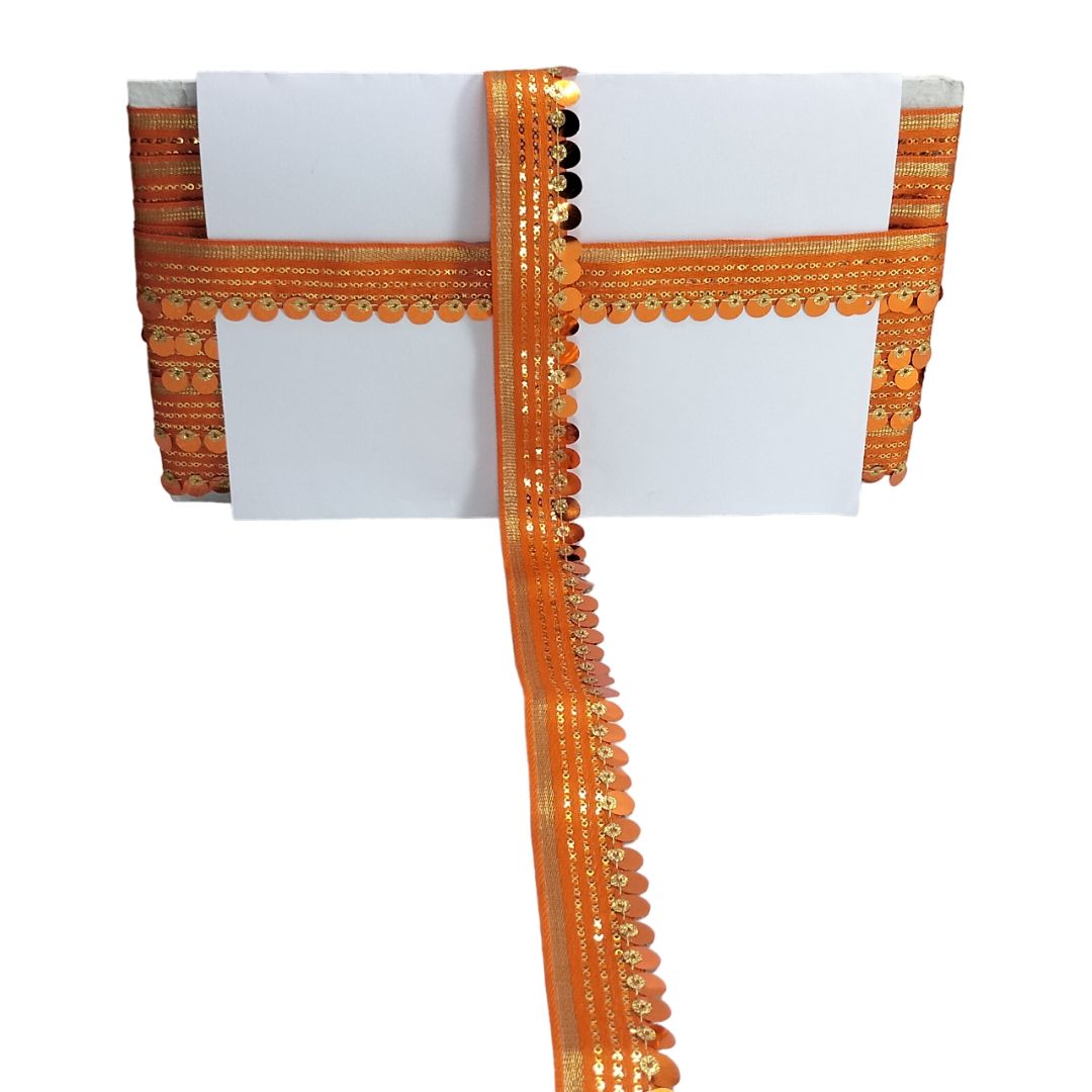 White saree with orange and gold border on a white background