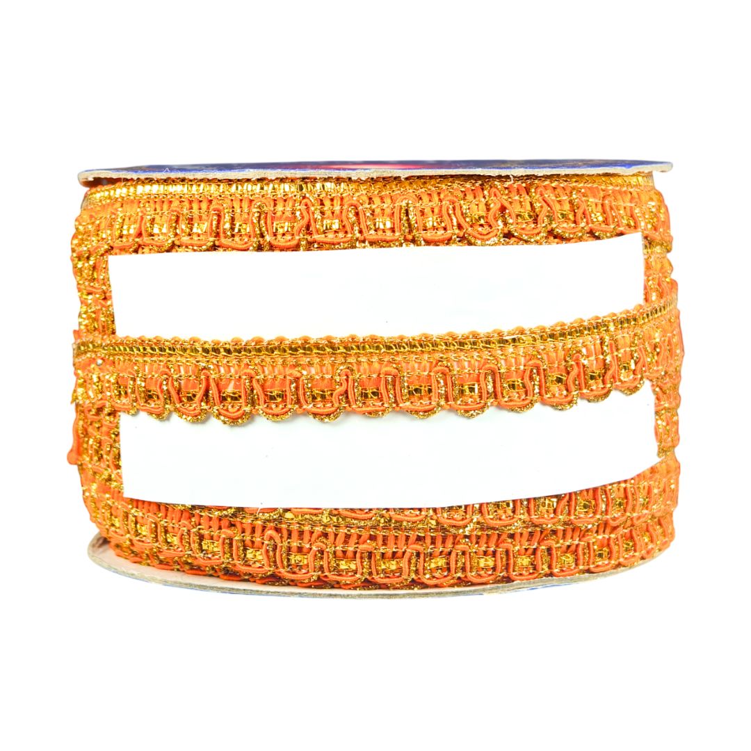 Spool of orange lace ribbon on a white background