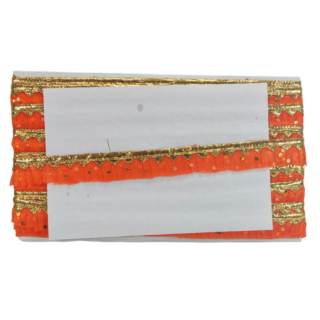 Clutch bag with orange and gold decorative border on a white background